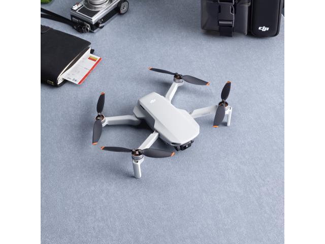 DJI Mini 2 Ultralight and Foldable Drone Quadcopter, 3-Axis Gimbal with 4K Camera, 12MP Photo, 31 Mins Flight Time, OcuSync 2.0 10km HD Video Transmission, QuickShots Gray